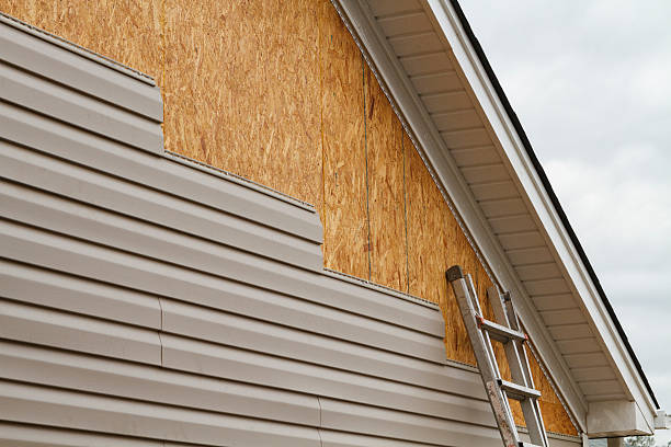 Professional Storm Damage Siding Repair technician working in Charlotte, NC